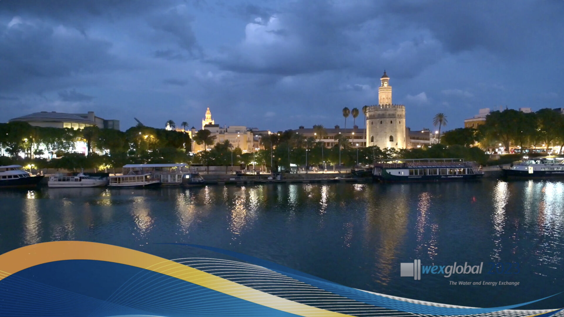 Cover slide of WEX Global highlights video showing the river view from the Acuario de Sevilla